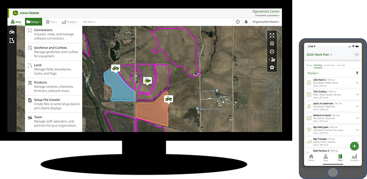 Photo of a screen grab from John Deere's Operations Center software displayed on a monitor and phone