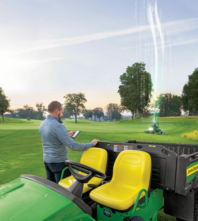 Image of a gator, using OnLink from John Deere on a golf course